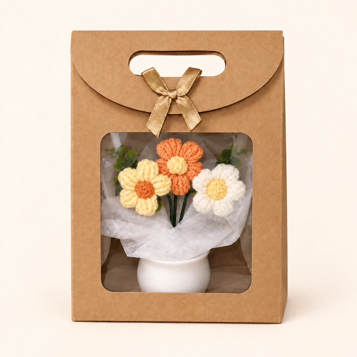 Everlasting Love crochet flower pot in orange, presented in a gift bag