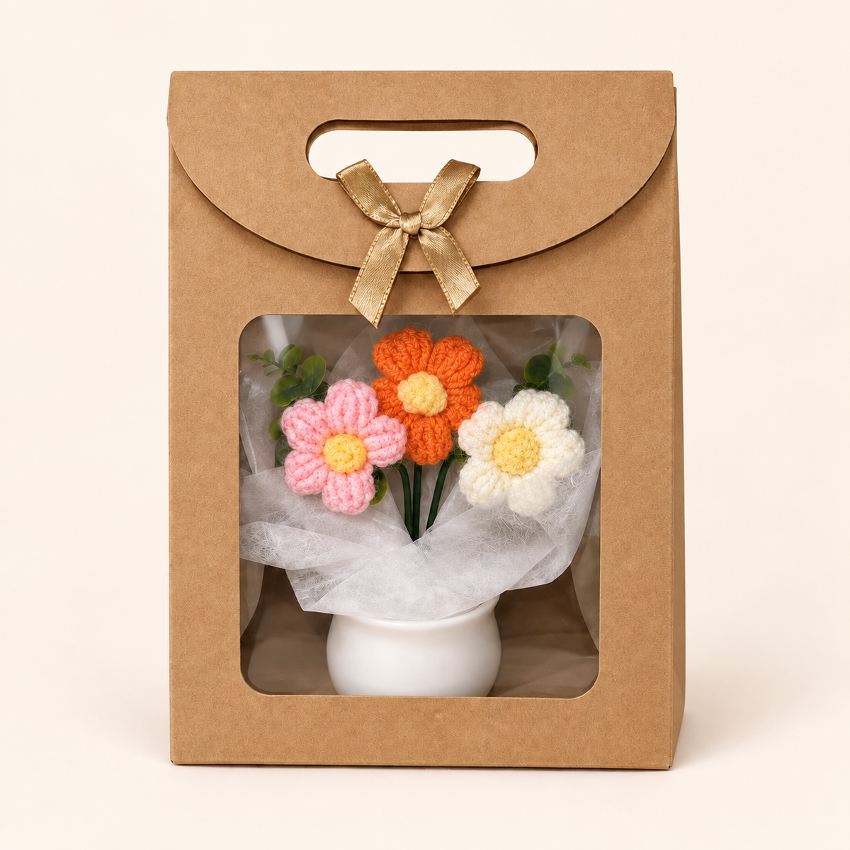 Everlasting Love crochet flower pot in pink/orange, presented in a gift bag